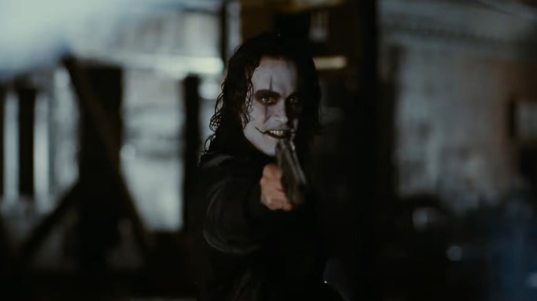 Eric pointing a gun