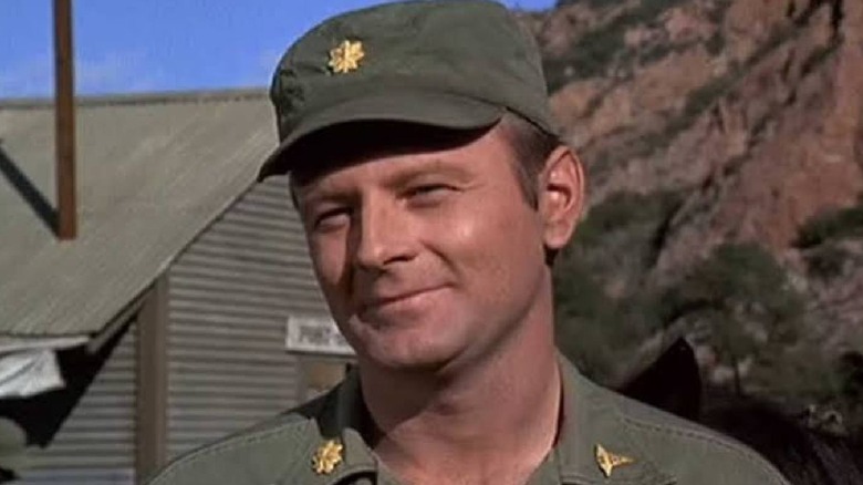 Frank Burns smiling