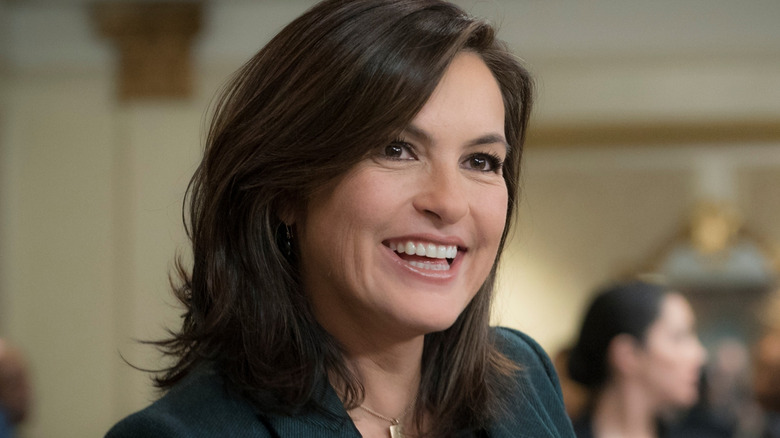Benson cracks a rare smile on 