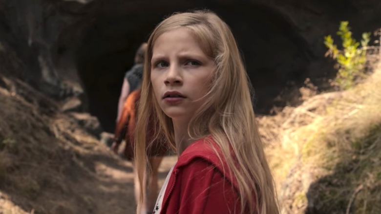 Kids entering a tunnel