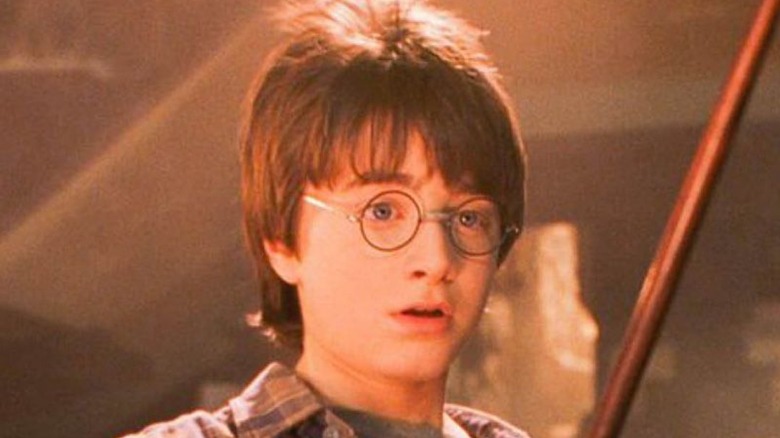 Harry looking at his wand