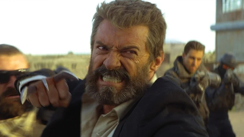 Logan unsheathing his claws in Logan