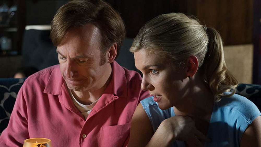 Bob Odenkirk as Jimmy and Rhea Seehorn as Kim scamming a mark on Better Call Saul