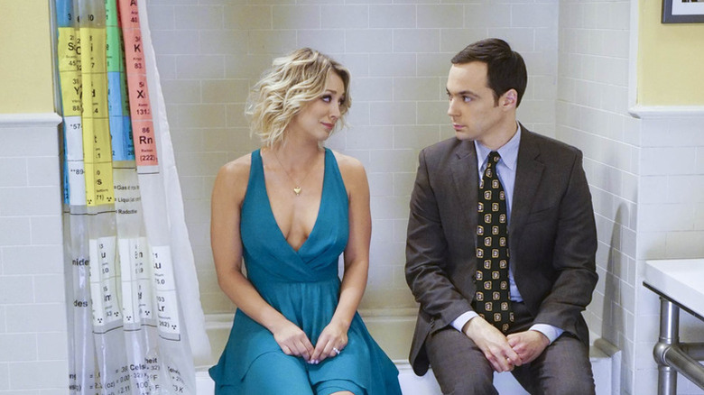Penny and Sheldon sitting in the bathroom together on The Big Bang Theory