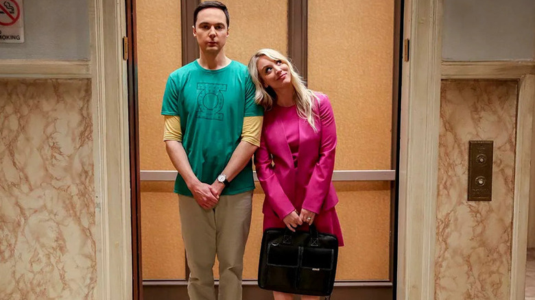 Sheldon taking the elevator with Penny's head on his shoulder on The Big Bang Theory
