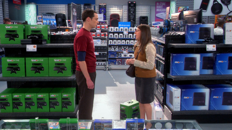 Sheldon and Amy shopping for a new game system