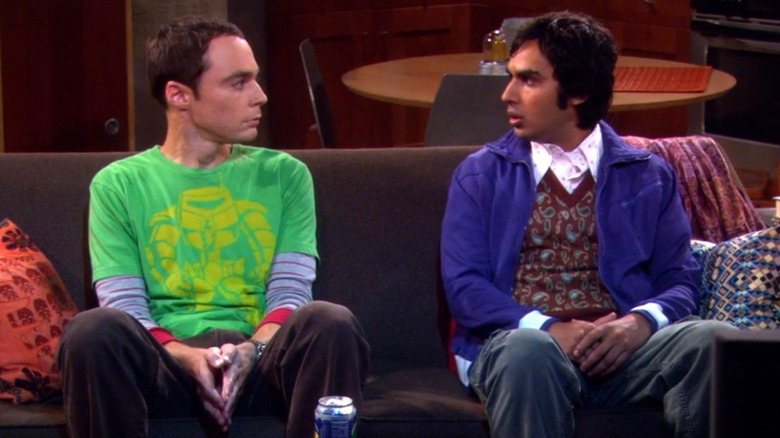 Sheldon and Raj looking at each other on couch