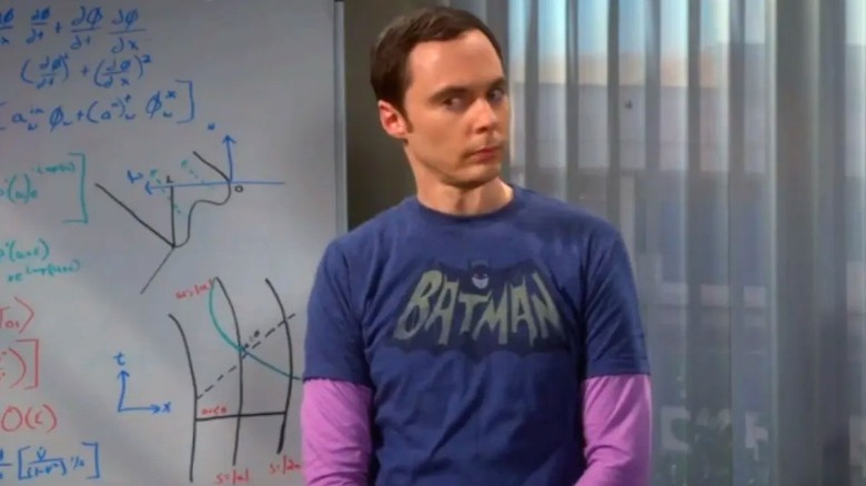 Sheldon Cooper next to a whiteboard