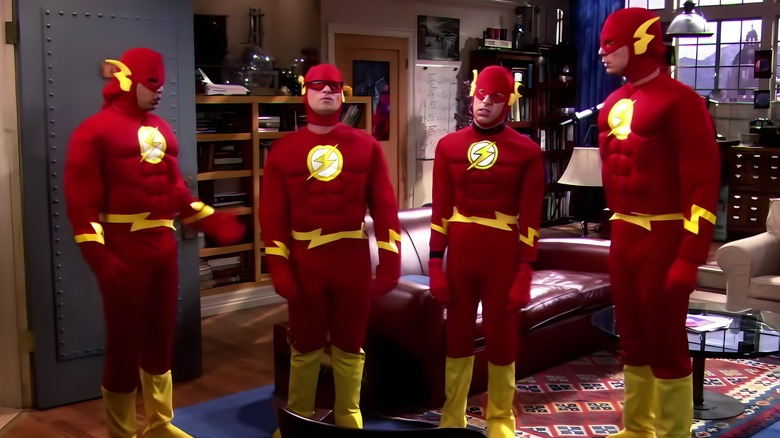 Leonard, Raj, Howard, and Sheldon annoyed and dressed as The Flash