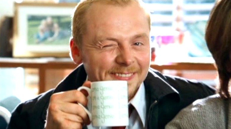 Simon Pegg Shaun smiling winking coffee