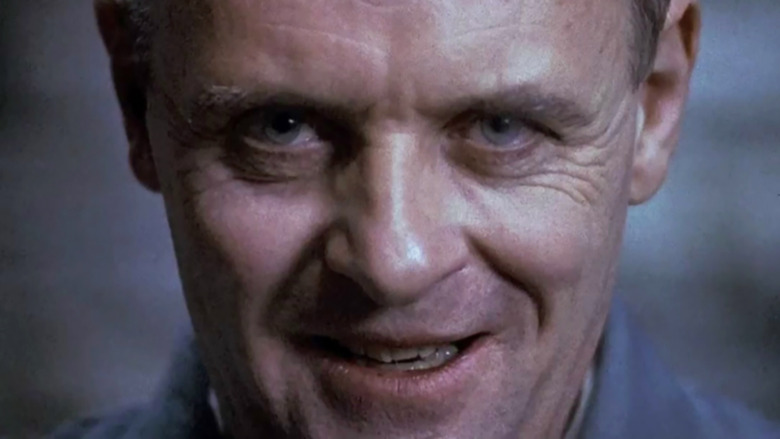 Hannibal Lecter smiling at the camera 