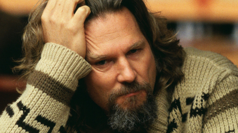 The Dude sits at the bowling alley bar