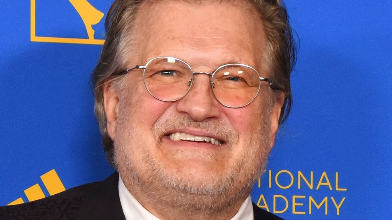 Drew Carey posing at a CBS event