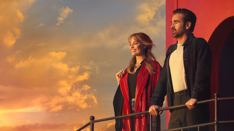 Sarah and David standing on a lighthouse balcony in A Big Bold Beautiful Journey (2025)