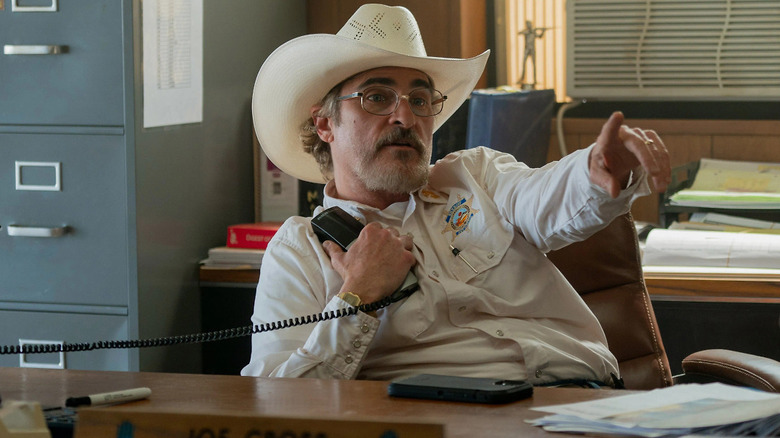 Joe cross on the phone in Eddington (2025)