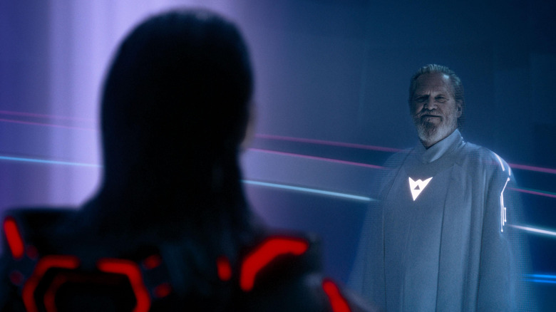 Kevin Flynn staring intently at Ares in Tron: Ares (2025)