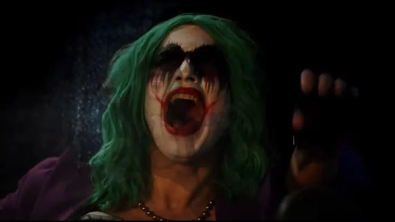 Joker the Harlequin laughs