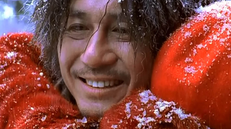 Choi Min-sik in an embrace