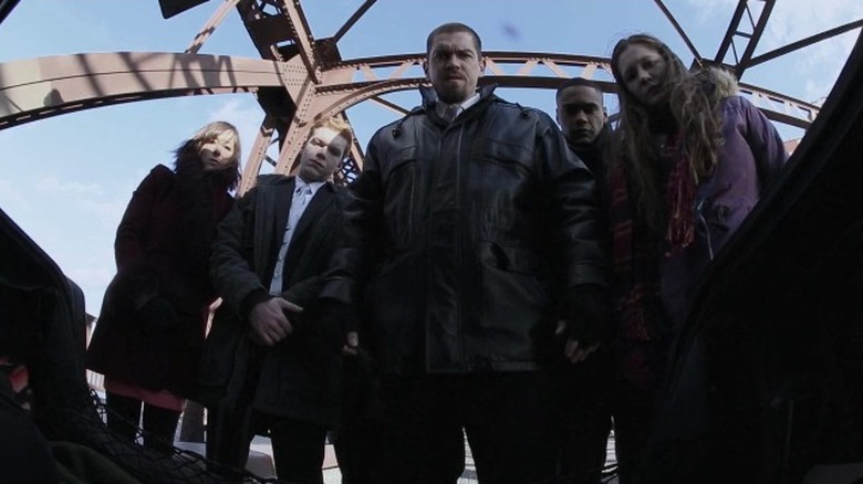 The group looks down