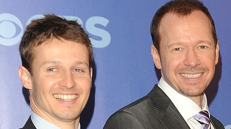Will Estes and Donnie Wahlberg posing