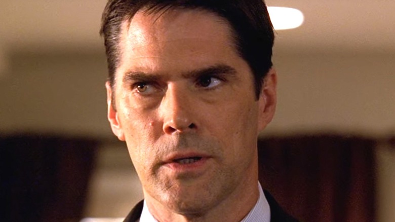 Thomas Gibson brown hair slicked back