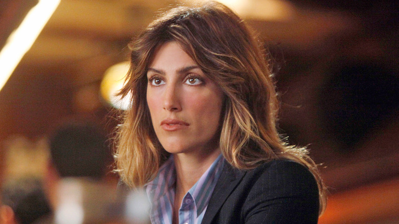 Jennifer Esposito staring to the left