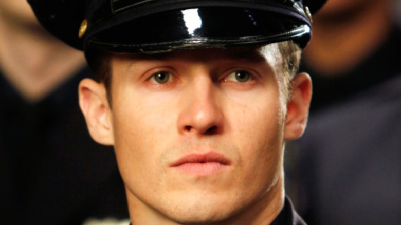 Will Estes as Jamie Reagan staring