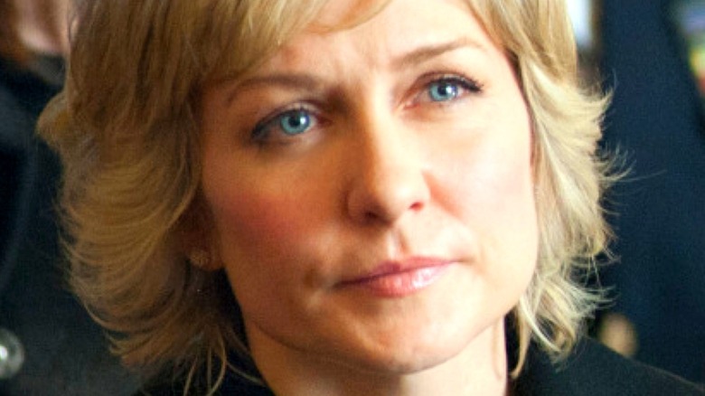 Amy Carlson staring ahead