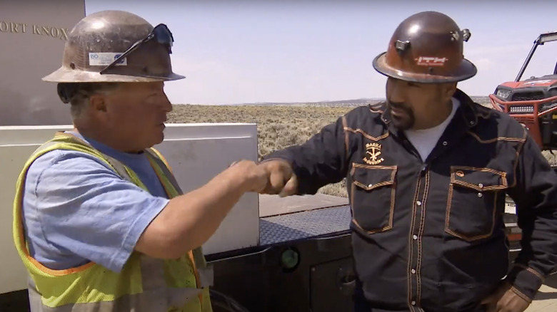 Fred and Juan bumping fists on Gold Rush