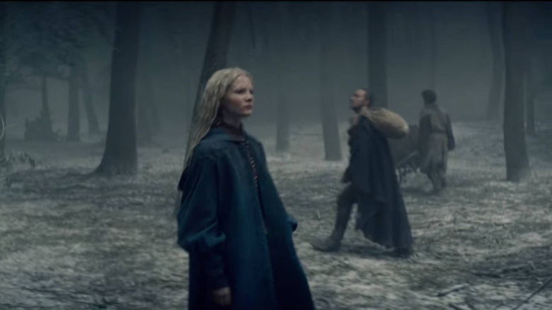 Ciri walking into camp