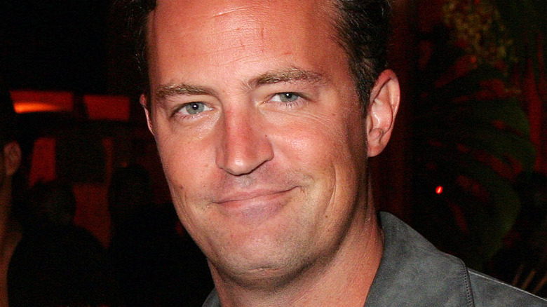 Matthew Perry looking smug