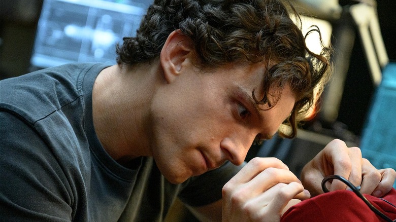 Peter tinkering in his workshop in Spider-Man: Brand New Day