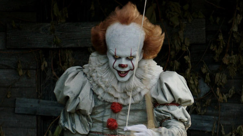 Pennywise holding a balloon