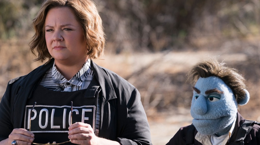 Melissa McCarthy as Connie Edwards and Bill Barretta as Phil Phillips in The Happytime Murders