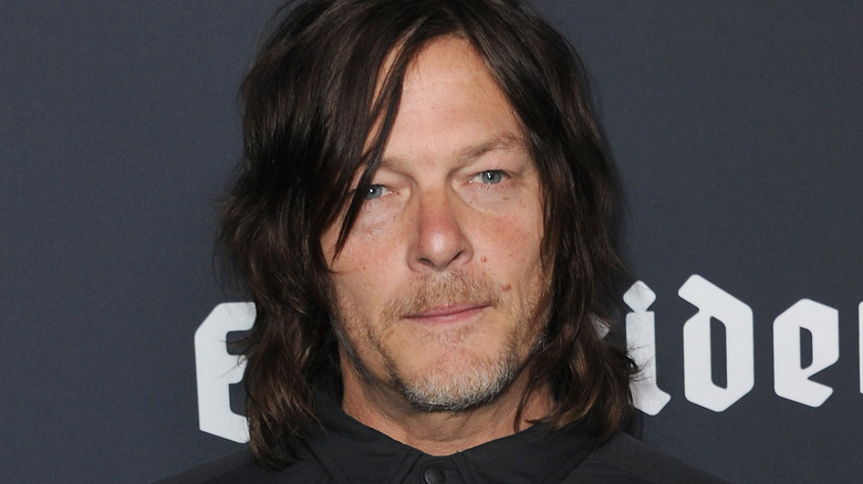 Norman Reedus smirking