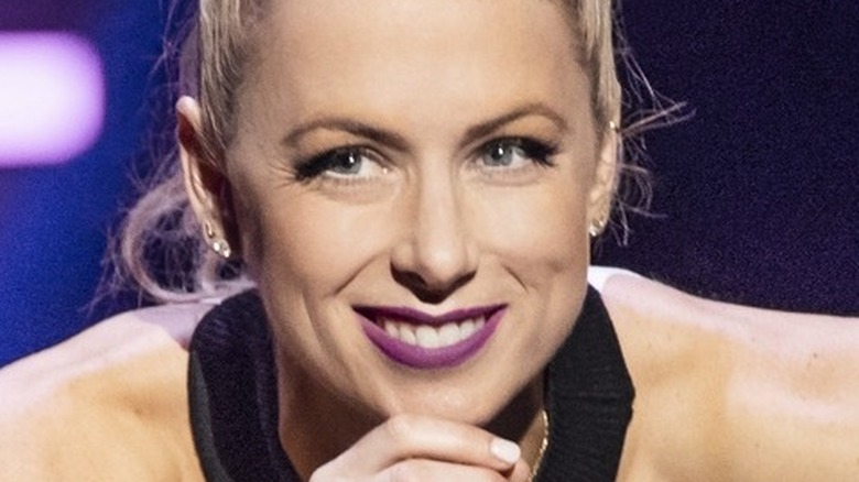 Iliza Shlesinger smiling onstage