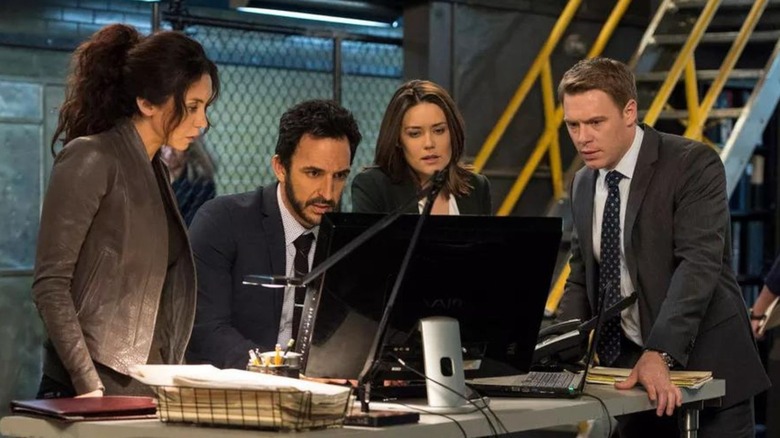 The Blacklist cast looking at a monitor