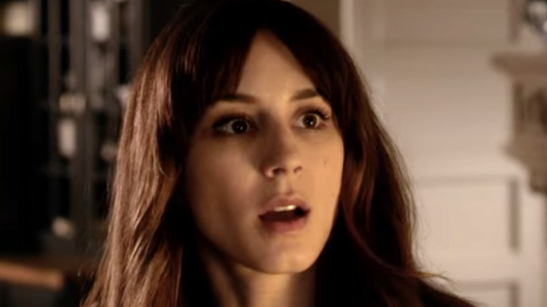 Troian Bellisario looking shocked