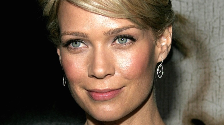 Laurie Holden on red carpet smiling