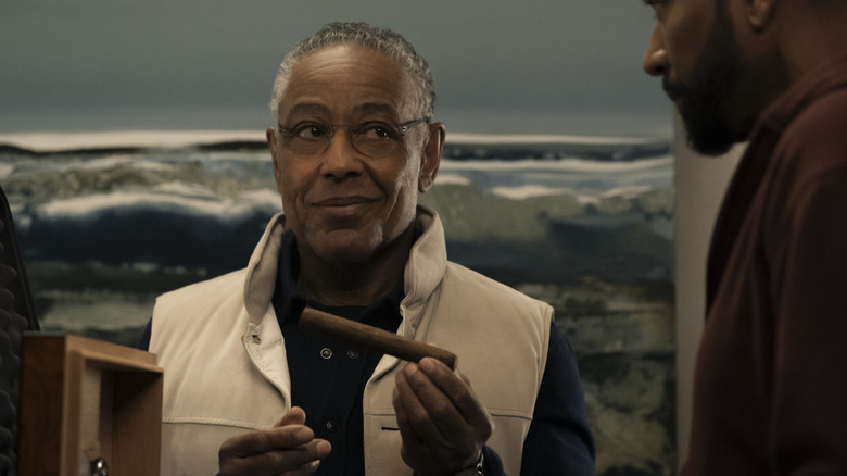 Stan Edgar holding up a cigar and smirking (2026)