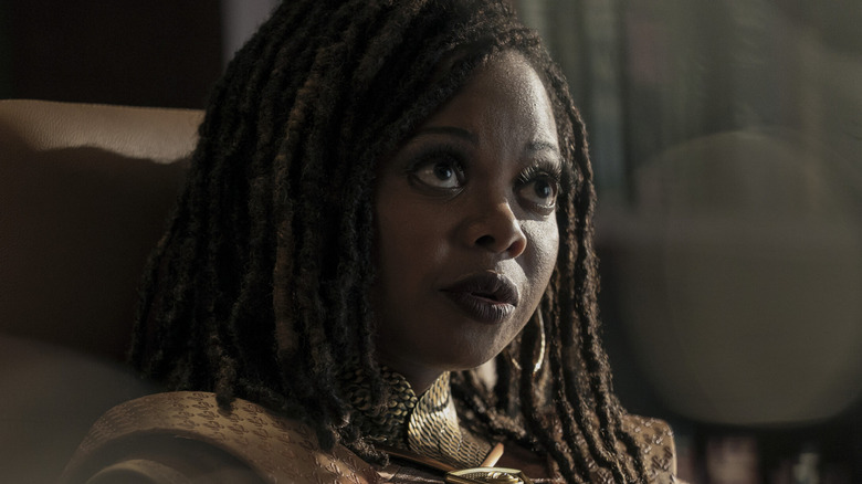 Sister Sage looking thoughtful and sitting on a chair in The Boys