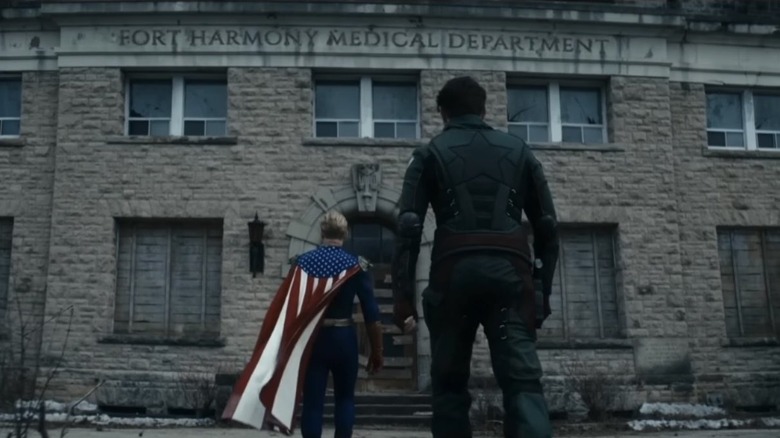 Homelander and Soldier Boy walking toward Fort Harmony Medical Department on The Boys