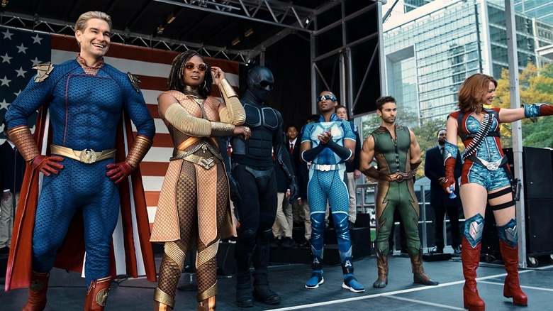 Supes onstage looking at the crowd on The Boys