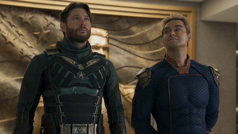 Homelander looks at Soldier Boy as they stand side by side