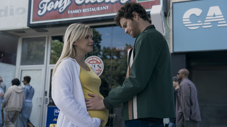 Hughie puts his hand on Annie's pregnant belly in "The Boys" (2019-2026)