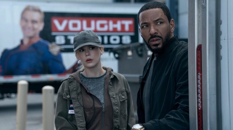 MM and Starlight standing next to a Vought Studios sign in The Boys