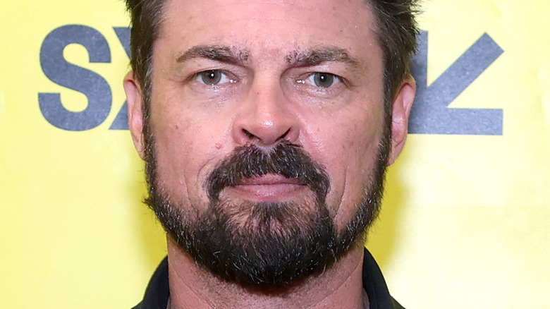 Karl Urban looking straight ahead