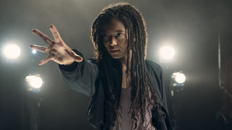 Marie Moreau reaching out with her arm on Gen V