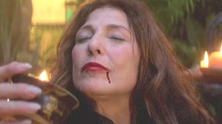 Catherine Keener drinking blood