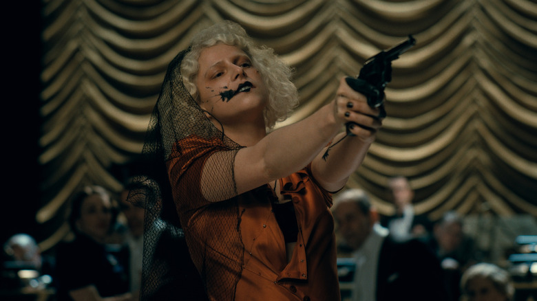 The Bride aiming a gun at a NYC party